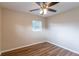 Bright bedroom with hardwood floors and ceiling fan at 3121 Bon Air Dr, Orlando, FL 32818