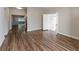 Hardwood floor living room with views into adjacent rooms at 3121 Bon Air Dr, Orlando, FL 32818