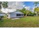 Home exterior and grassy backyard at 3121 Bon Air Dr, Orlando, FL 32818