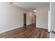 Bright living room with hardwood floors and access to other rooms at 3121 Bon Air Dr, Orlando, FL 32818