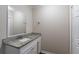 Bright bathroom with granite countertop vanity and updated fixtures at 3121 Bon Air Dr, Orlando, FL 32818