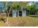 Grey metal storage shed in backyard at 3121 Bon Air Dr, Orlando, FL 32818