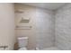 Clean bathroom with a large shower and updated tile at 3121 Bon Air Dr, Orlando, FL 32818