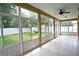 Spacious screened porch overlooking the backyard at 733 Calusa Ct, Apopka, FL 32712