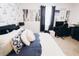 Bedroom with a desk, chair, and nautical-themed decor at 1532 Nassau Point Trl, Kissimmee, FL 34747