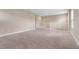 Spacious loft area with plush carpeting at 1352 Silo Dr, St Cloud, FL 34771