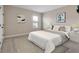 Comfortable bedroom with a bed, window, and neutral decor at 1352 Silo Dr, St Cloud, FL 34771