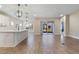 Spacious kitchen with island, stainless steel appliances, and view to living area at 1352 Silo Dr, St Cloud, FL 34771