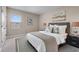 Spacious bedroom with large bed, window, and ample light at 1352 Silo Dr, St Cloud, FL 34771
