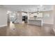 Open kitchen with an island and stainless steel appliances at 1352 Silo Dr, St Cloud, FL 34771