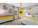 bedroom with bunk beds and yellow accents at 4715 Terra Esmeralda Dr, Kissimmee, FL 34746