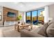 Comfortable living room with sliding doors leading to a patio at 4715 Terra Esmeralda Dr, Kissimmee, FL 34746