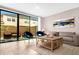 Relaxing living room featuring sliding glass doors and modern decor at 4715 Terra Esmeralda Dr, Kissimmee, FL 34746