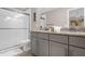 Elegant bathroom with double vanity and a large walk-in shower at 4715 Terra Esmeralda Dr, Kissimmee, FL 34746
