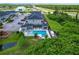 Aerial view of community pool and homes at 4715 Terra Esmeralda Dr, Kissimmee, FL 34746