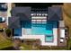 Community pool and spa with covered patio at 4715 Terra Esmeralda Dr, Kissimmee, FL 34746