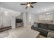 Living room with TV, comfortable seating, and view of stairs at 1029 Park Ridge Cir, Kissimmee, FL 34746