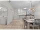 View of dining area and kitchen from the living room at 1029 Park Ridge Cir, Kissimmee, FL 34746