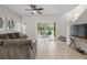 Spacious living room with comfortable seating and access to backyard at 1029 Park Ridge Cir, Kissimmee, FL 34746