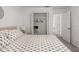 Main bedroom with king bed, walk-in closet and access to hall at 1029 Park Ridge Cir, Kissimmee, FL 34746