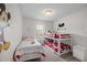 Mickey Mouse themed bedroom with twin and bunk beds at 1029 Park Ridge Cir, Kissimmee, FL 34746