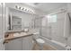 Clean bathroom with a tub shower combination and updated vanity at 1029 Park Ridge Cir, Kissimmee, FL 34746