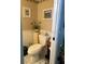 Simple bathroom with toilet and small vanity at 172 Lago Vista Blvd, Casselberry, FL 32707