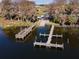 Community boat docks on calm water at 172 Lago Vista Blvd, Casselberry, FL 32707