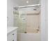 Clean bathroom with a bathtub and sliding glass door at 3702 Palm Desert Ln # 5431, Orlando, FL 32839