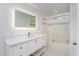 Bathroom with a walk-in shower and white vanity at 3702 Palm Desert Ln # 5431, Orlando, FL 32839
