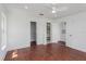 Bright bedroom with wood floors, spacious closet, and access to bathroom at 3702 Palm Desert Ln # 5431, Orlando, FL 32839