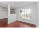Bright dining room with hardwood floors and large window at 3702 Palm Desert Ln # 5431, Orlando, FL 32839
