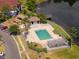Community pool with surrounding patio and gazebo at 3702 Palm Desert Ln # 5431, Orlando, FL 32839