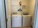 Convenient laundry room with washer, dryer, and storage at 238 Carrera Ave, Davenport, FL 33897