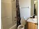 Clean bathroom with a bathtub, toilet, and vanity at 238 Carrera Ave, Davenport, FL 33897