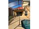 View of the screened in pool and patio area at 238 Carrera Ave, Davenport, FL 33897