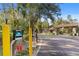 Gated community entrance with security kiosk at 1511 Orange Valley Rdg, Ocoee, FL 34761