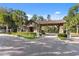 Gated community entrance with stone and wood accents at 1511 Orange Valley Rdg, Ocoee, FL 34761