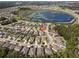 Aerial view showing home location in a community with a lake at 1511 Orange Valley Rdg, Ocoee, FL 34761