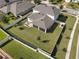 Aerial view showcasing the house and large backyard at 1511 Orange Valley Rdg, Ocoee, FL 34761