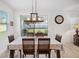 Dining area with sliding doors leading to the backyard at 1511 Orange Valley Rdg, Ocoee, FL 34761