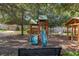 Dual slide playground structure with a nearby bench at 1511 Orange Valley Rdg, Ocoee, FL 34761