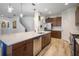 Modern kitchen, stainless steel appliances, and light wood cabinets at 1511 Orange Valley Rdg, Ocoee, FL 34761