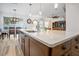 Large kitchen island with seating, modern cabinets, and appliances at 1511 Orange Valley Rdg, Ocoee, FL 34761