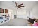 Spacious bonus room with built-in shelving and lots of natural light at 1511 Orange Valley Rdg, Ocoee, FL 34761