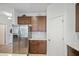 Stainless steel refrigerator and ample cabinetry in this kitchen at 1511 Orange Valley Rdg, Ocoee, FL 34761