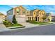 Two story home with grey siding and a two car garage at 1093 Berry Ln, Davenport, FL 33837