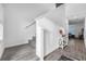 Bright entryway with staircase, tile flooring, and a console table at 1093 Berry Ln, Davenport, FL 33837
