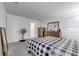 Primary bedroom with dresser, bed, and carpeted floor at 1093 Berry Ln, Davenport, FL 33837