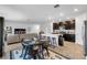 Open concept dining area with kitchen and living room views at 1093 Berry Ln, Davenport, FL 33837